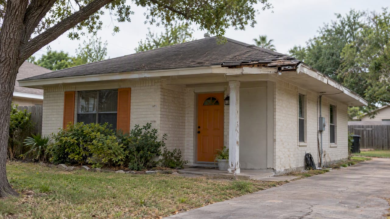 Edinburg home with visible roof wear